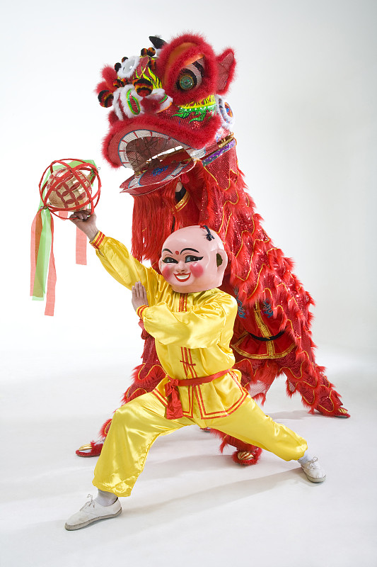 大头娃娃逗红醒狮图片下载